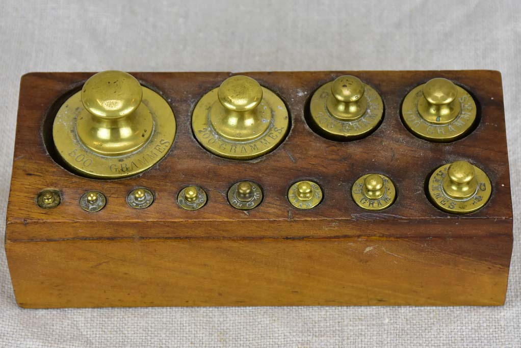 Set of twelve antique French weights for scales - 1-500g