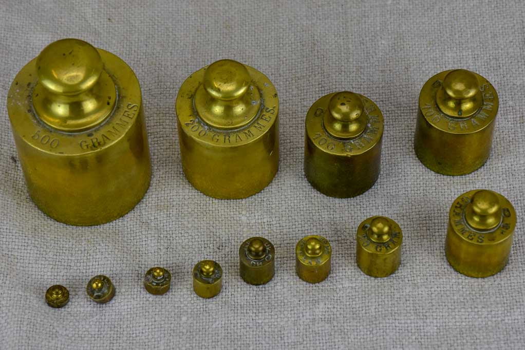 Set of twelve antique French weights for scales - 1-500g