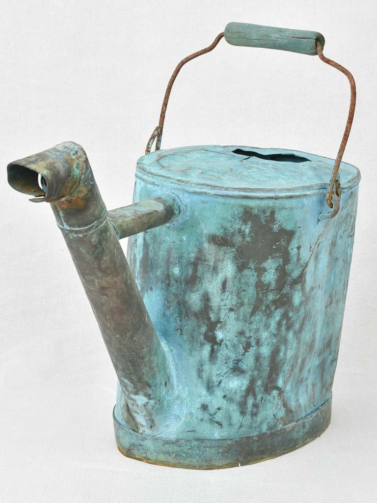 Antique French copper watering can with blue patina