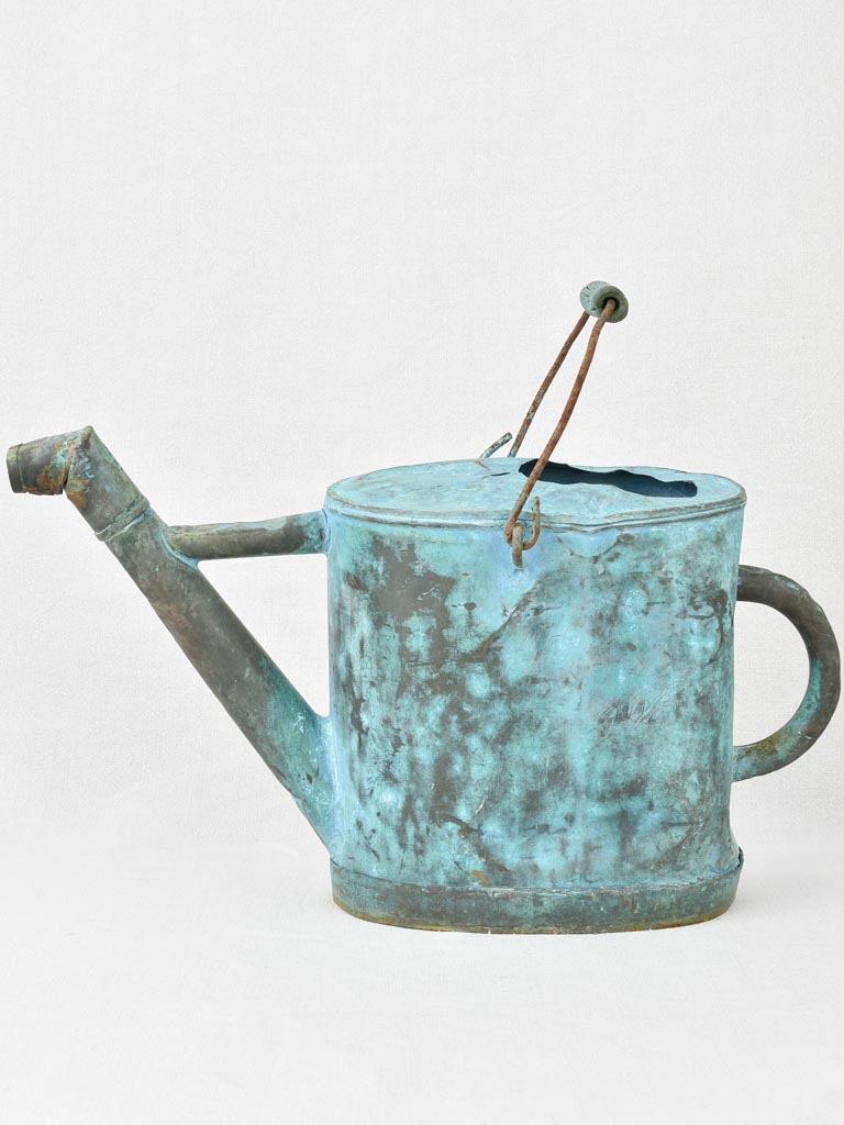 Antique French copper watering can with blue patina