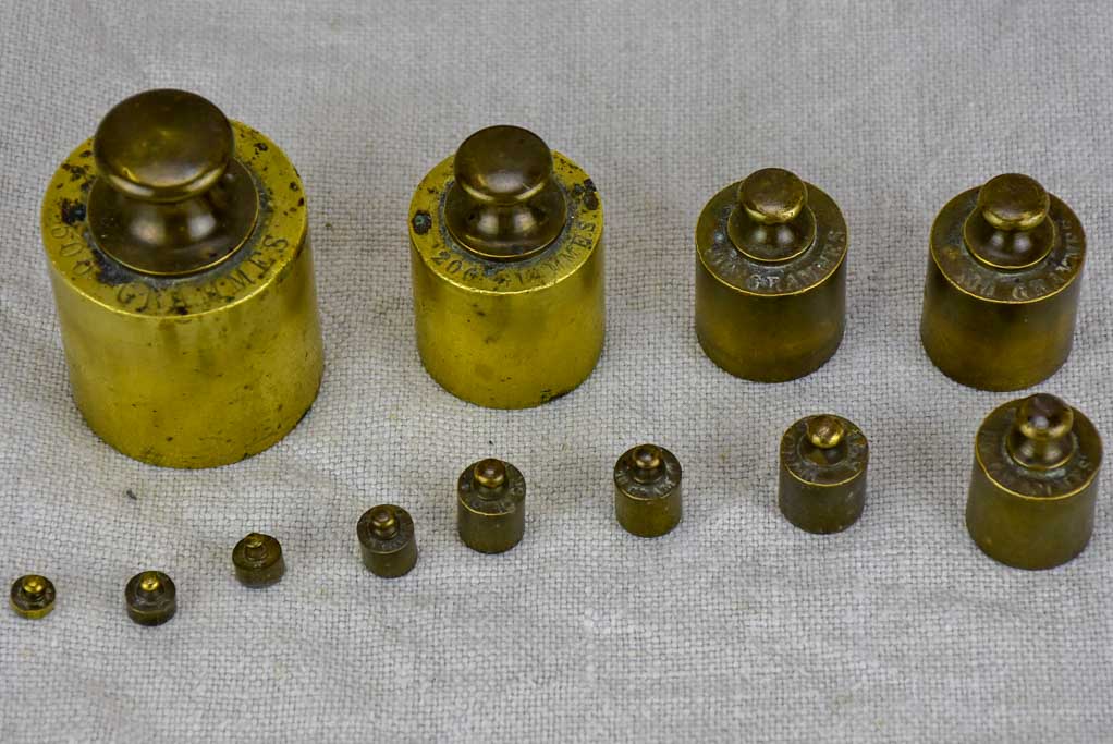 Set of twelve antique French weights for scales - 1-500g