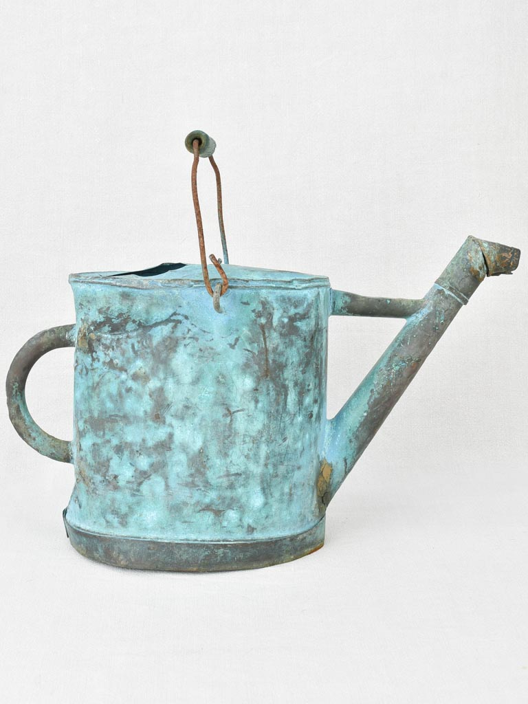 Antique French copper watering can with blue patina