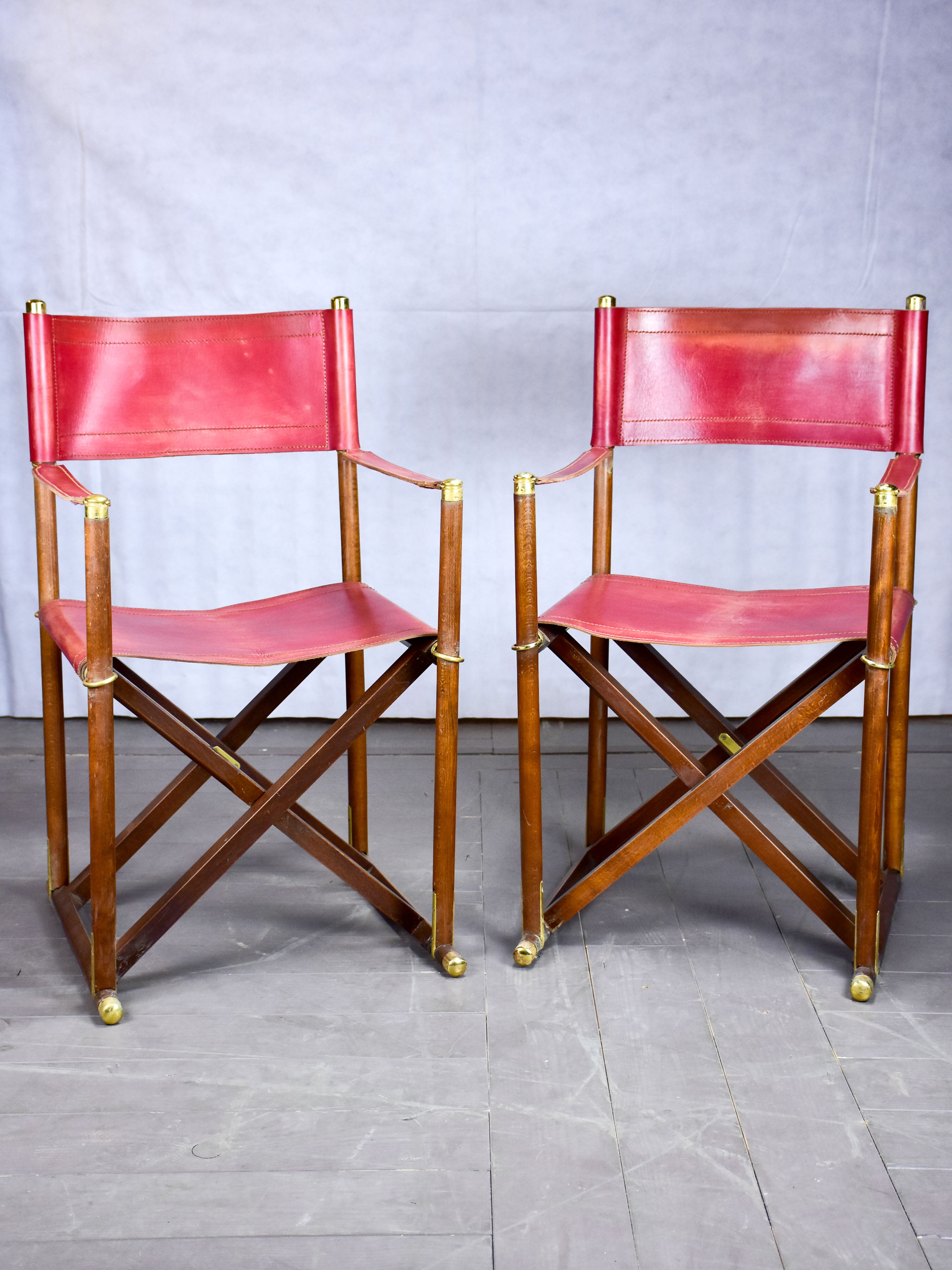 Pair of vintage Valenti folding chairs - red leather