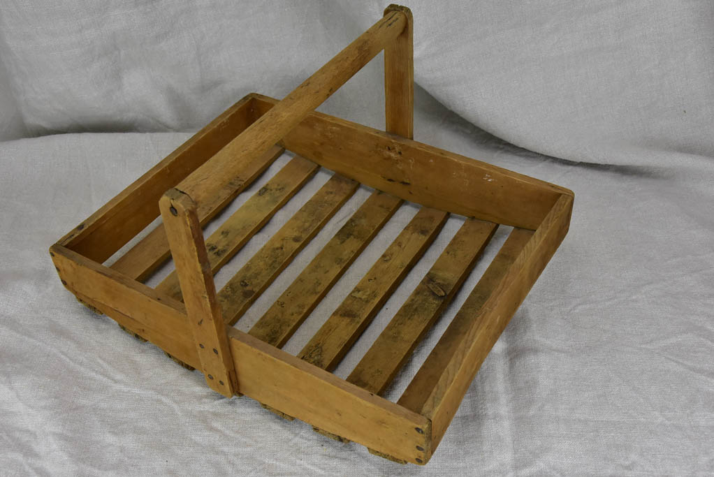 Antique French wooden potato harvest basket with terracotta pots