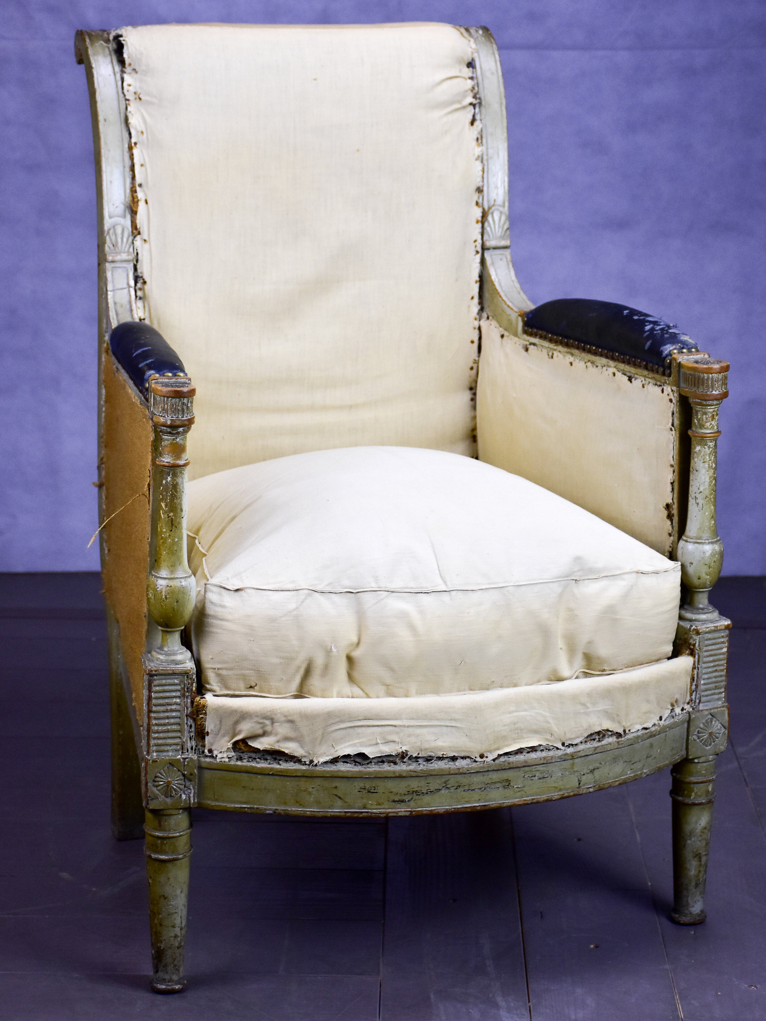Small antique French bergère armchair