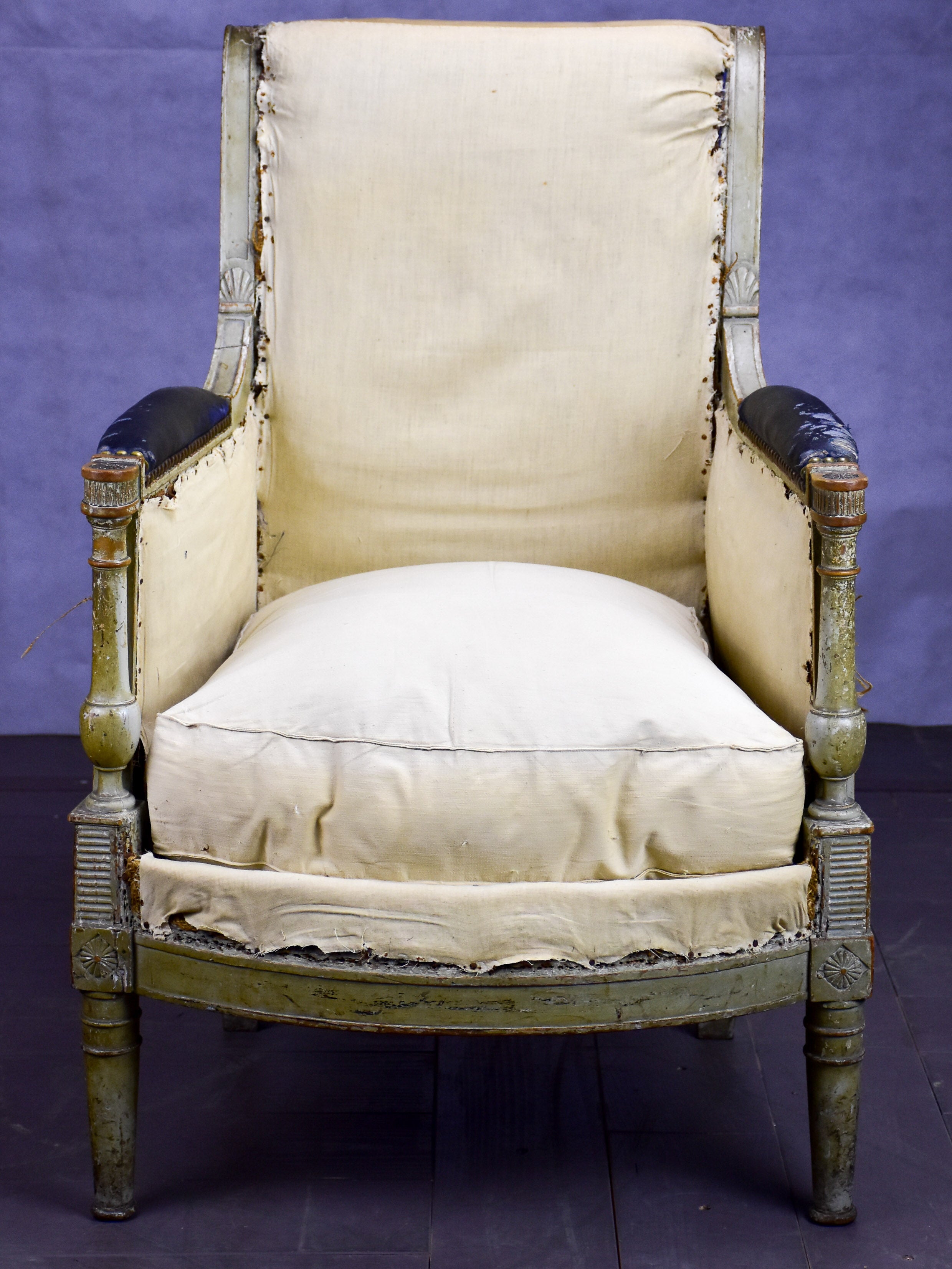 Small antique French bergère armchair