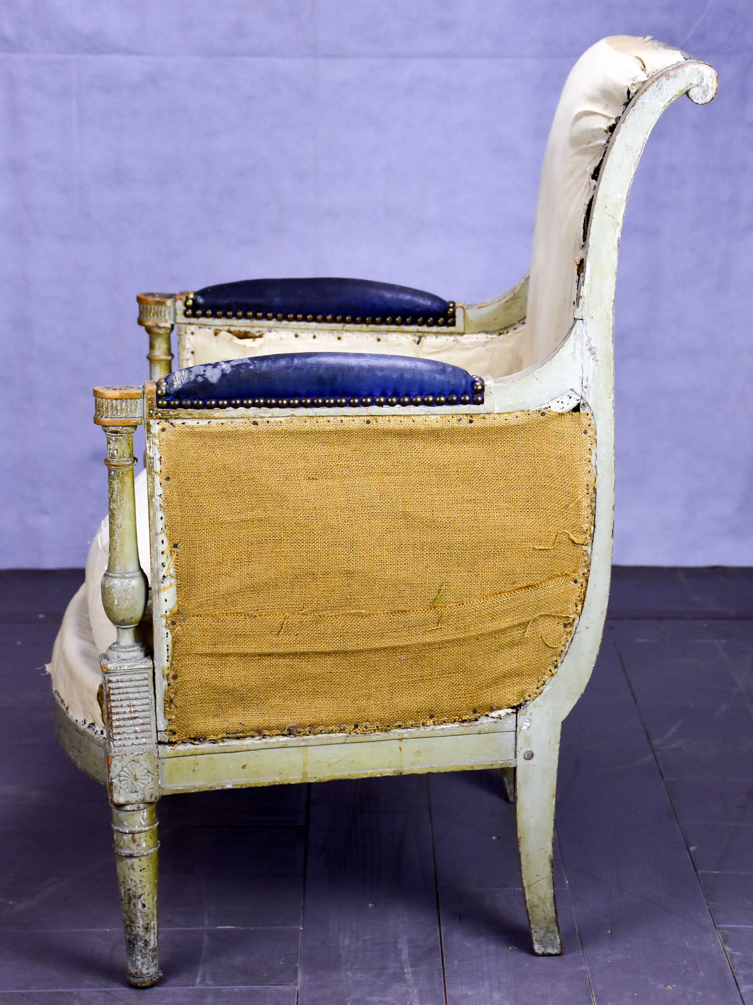 Small antique French bergère armchair