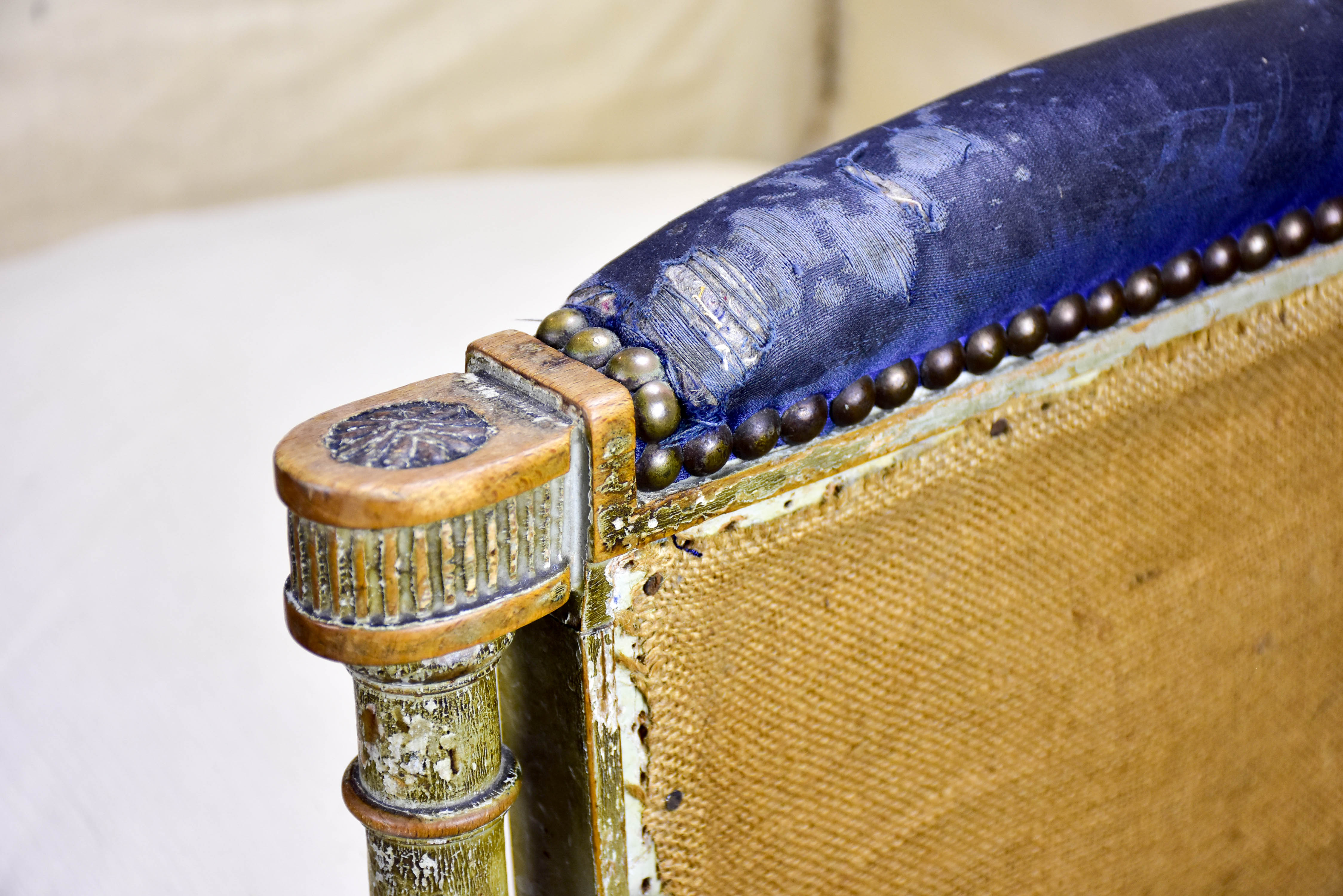 Small antique French bergère armchair
