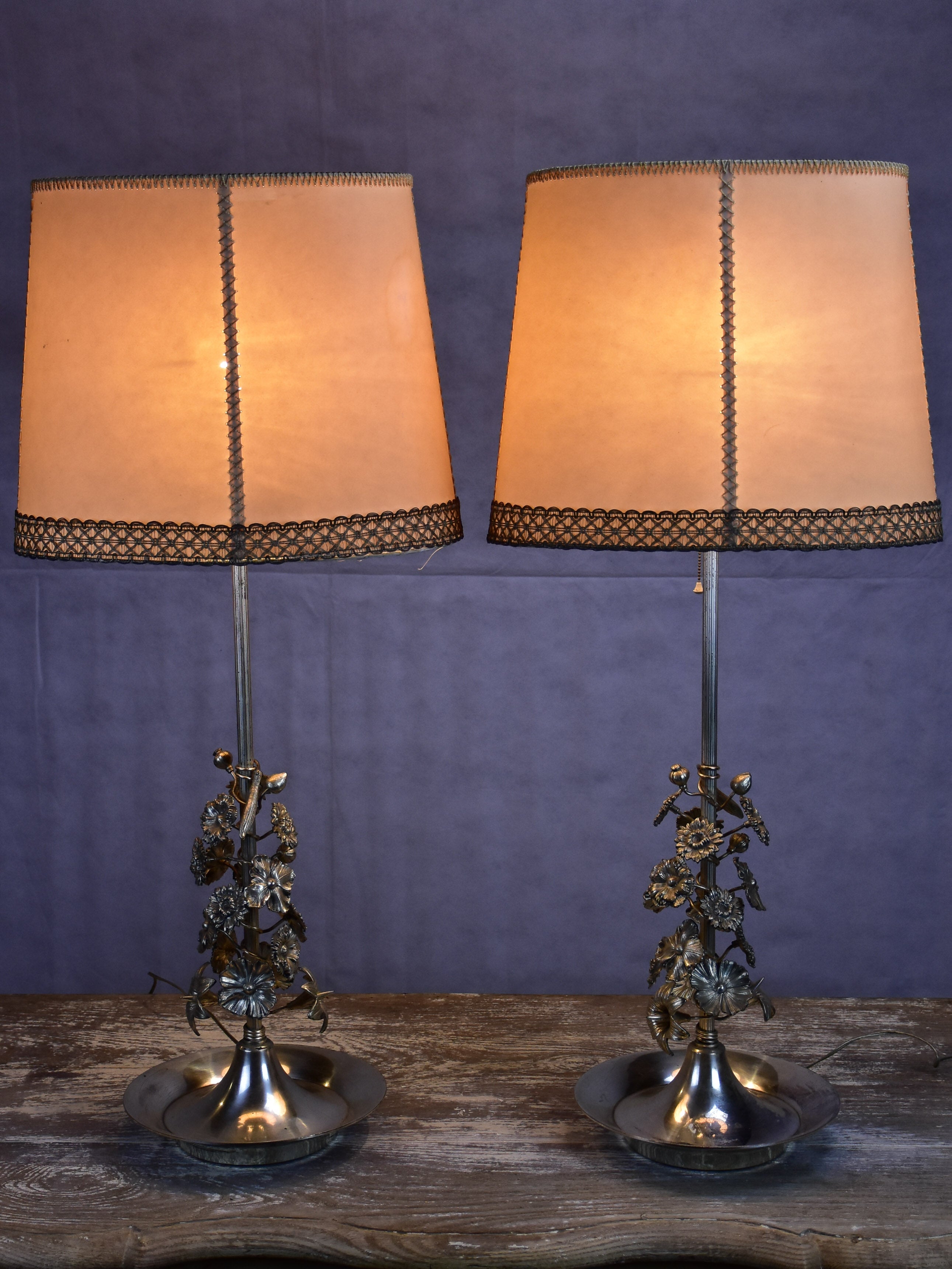 Pair of tall table lamps with parchment shades