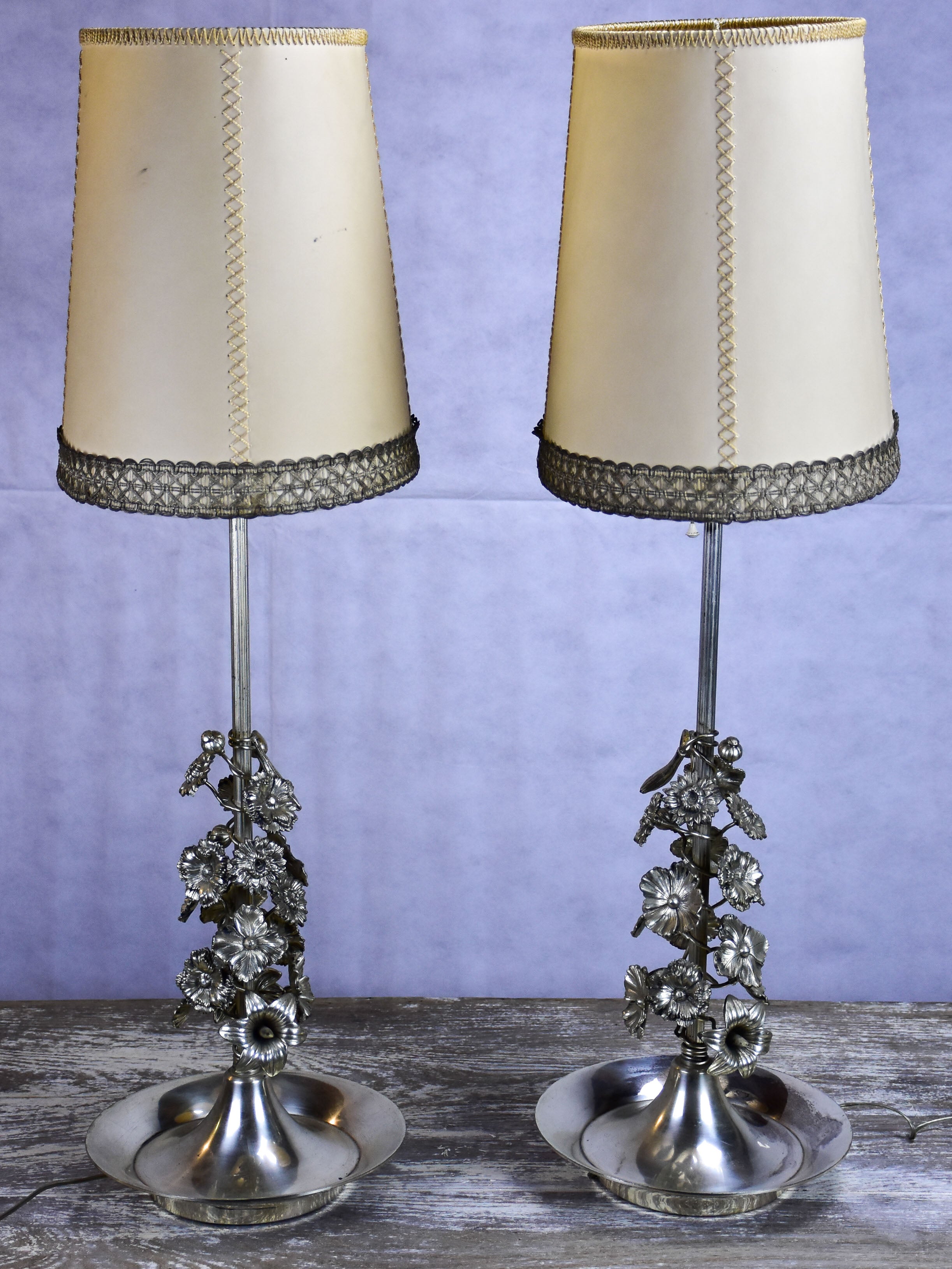 Pair of tall table lamps with parchment shades