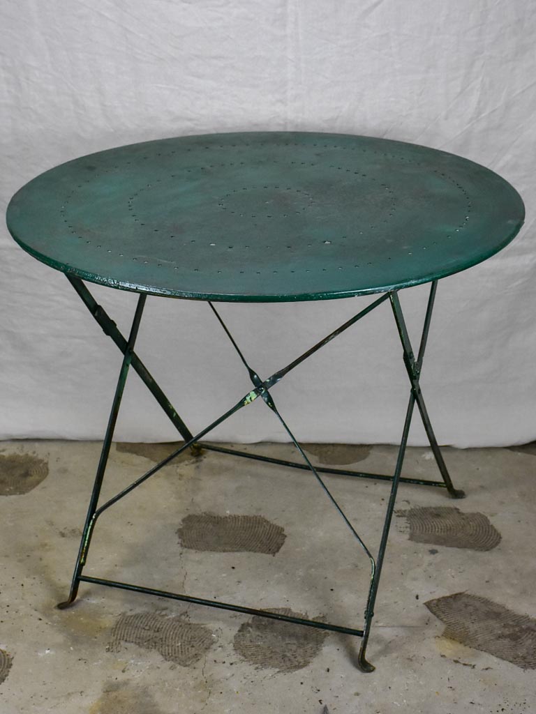 Round antique French folding garden table with green paint finish