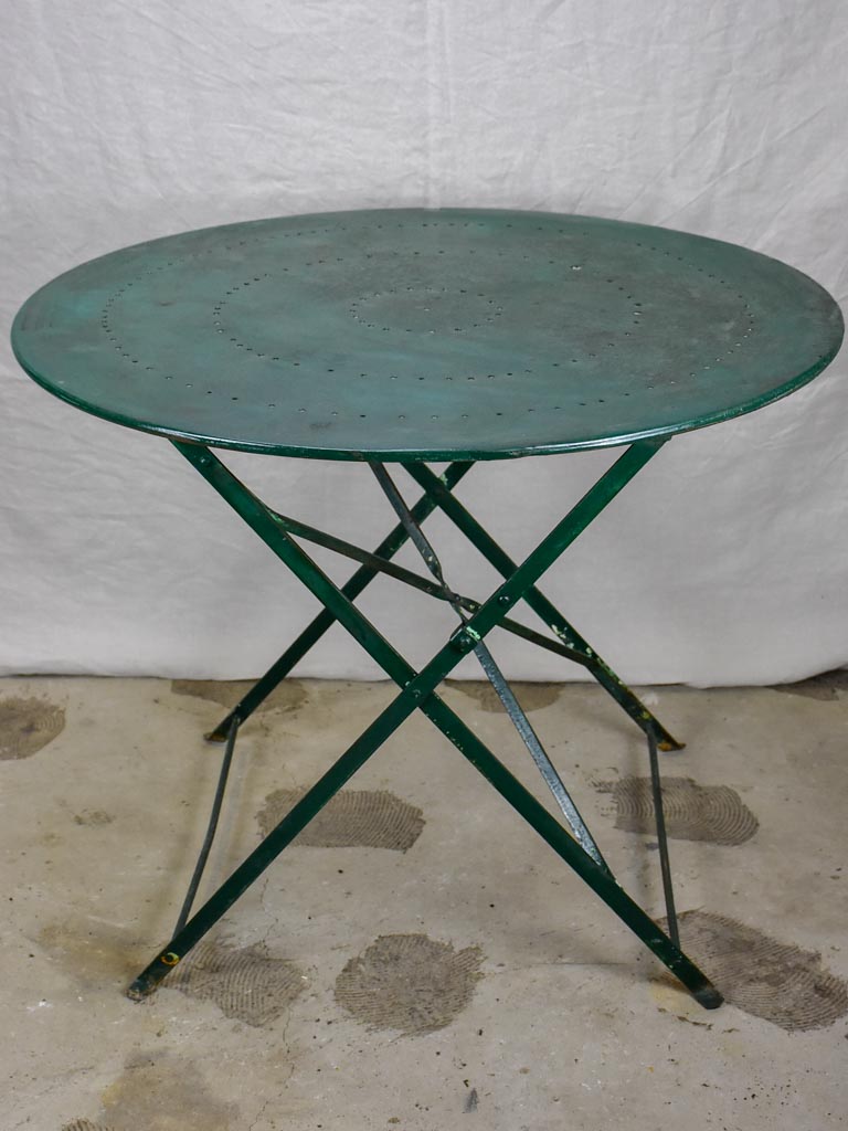 Round antique French folding garden table with green paint finish