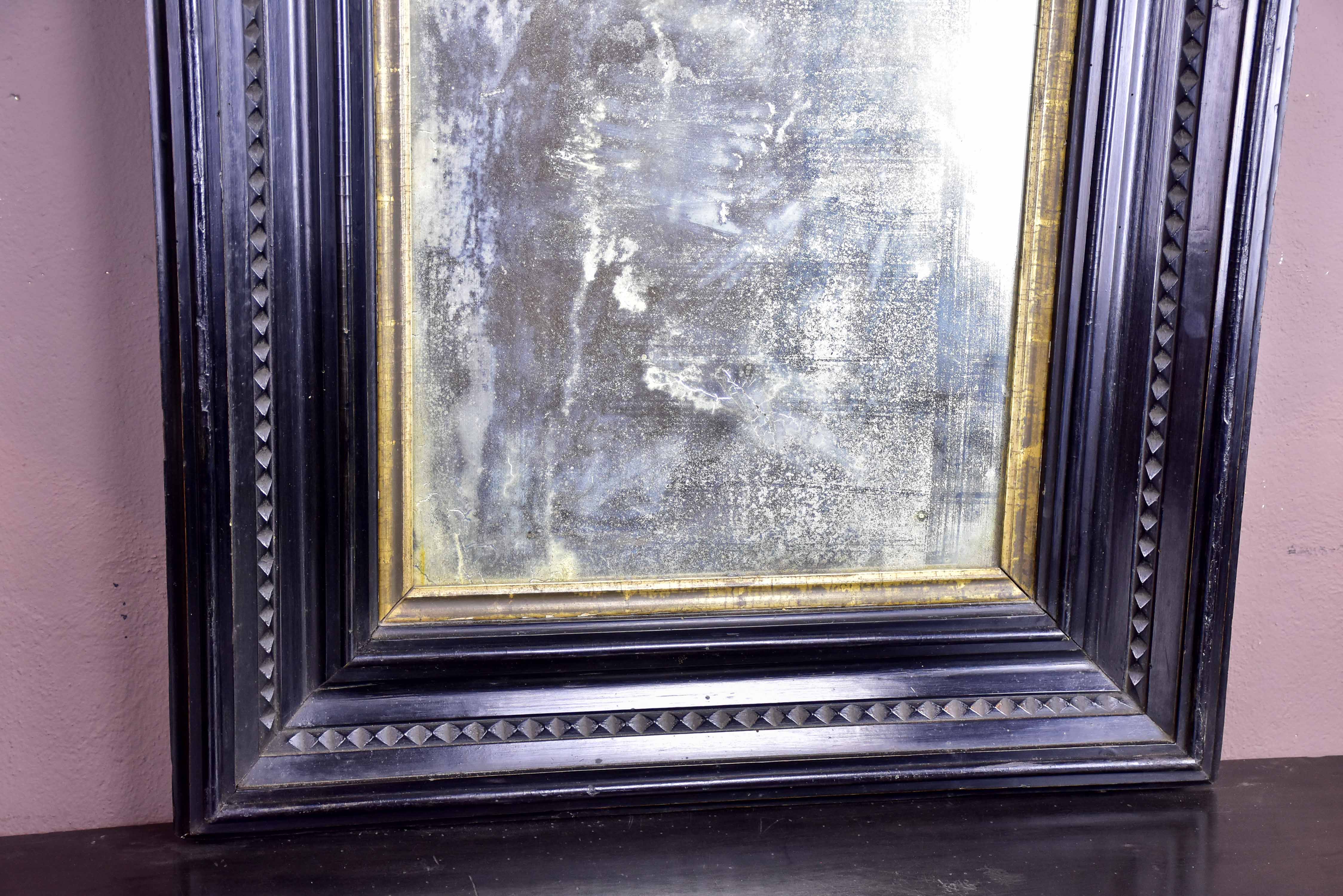 19th century Italian mirror with wide carved frame