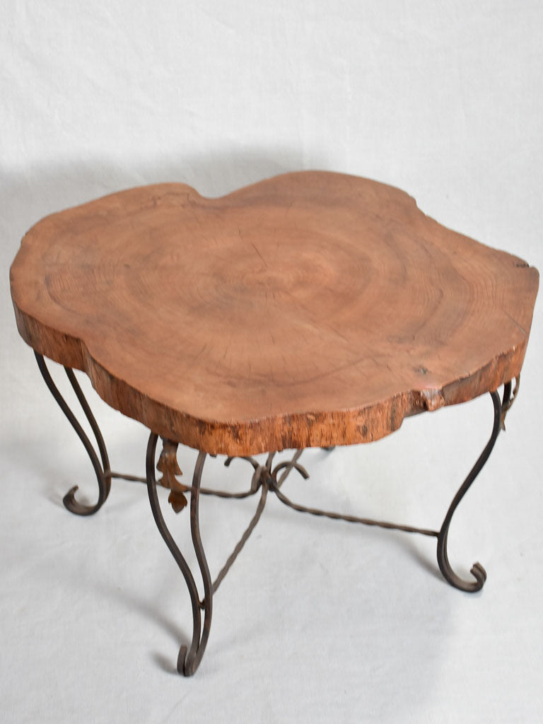 Mid-century brutalist tree trunk coffee table on wrought iron base 17"