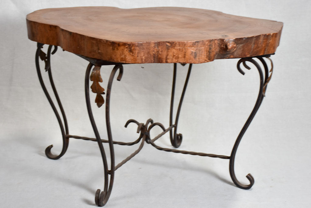 Mid-century brutalist tree trunk coffee table on wrought iron base 17"