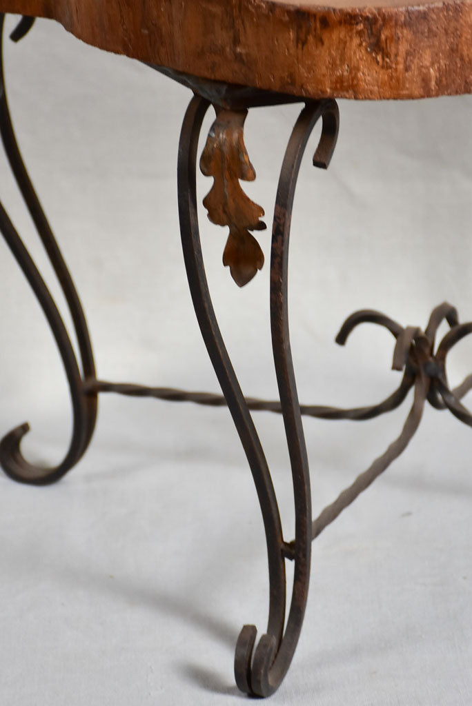 Mid-century brutalist tree trunk coffee table on wrought iron base 17"