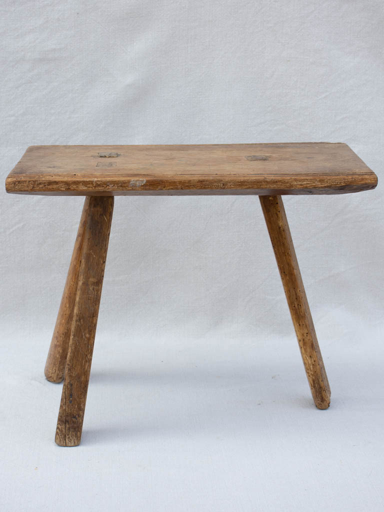 RESERVED Primitive milking stool with three legs