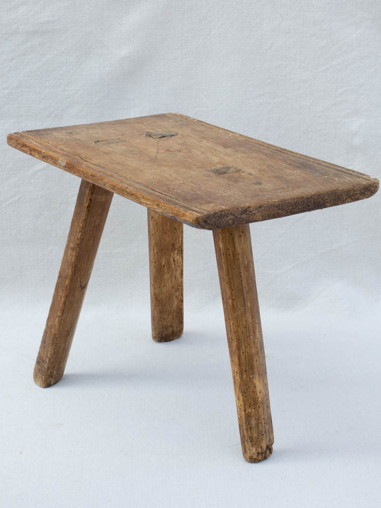 RESERVED Primitive milking stool with three legs
