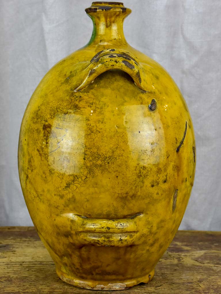 Antique French Provincial Conscience jug with yellow glaze - water / oil