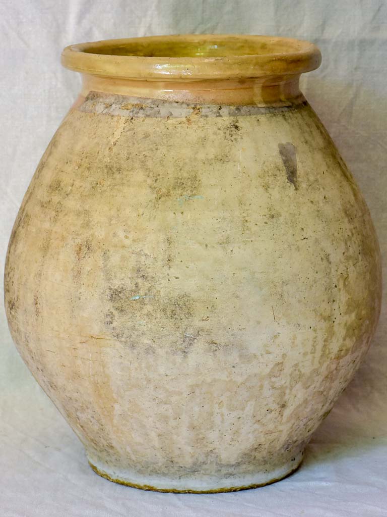 Small early 20th Century French Biot olive jar 18"