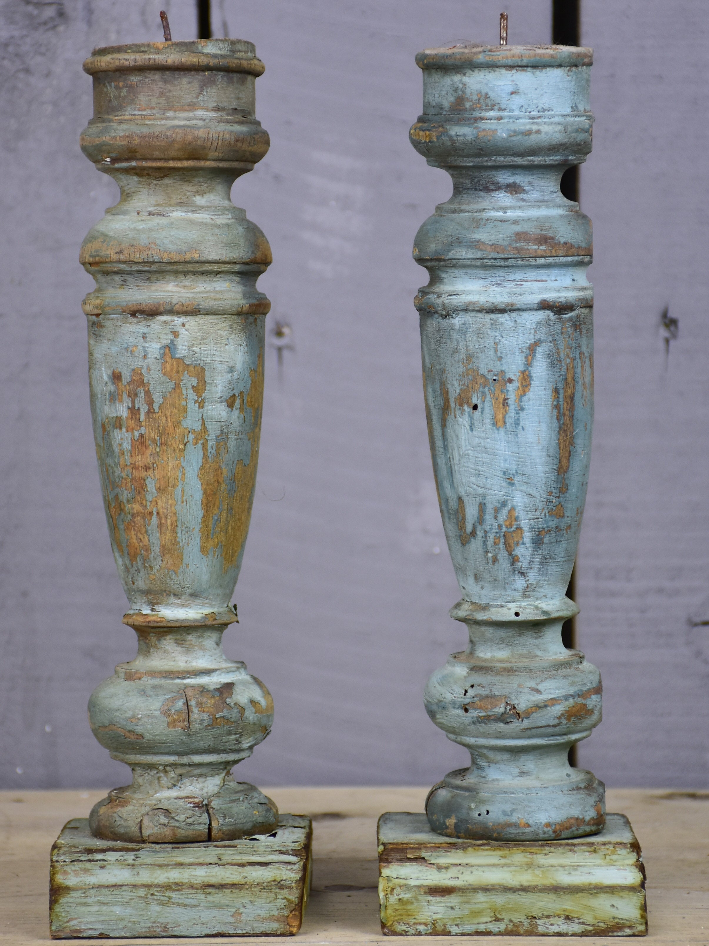 Pair of artisan-made French candlesticks with salvaged materials