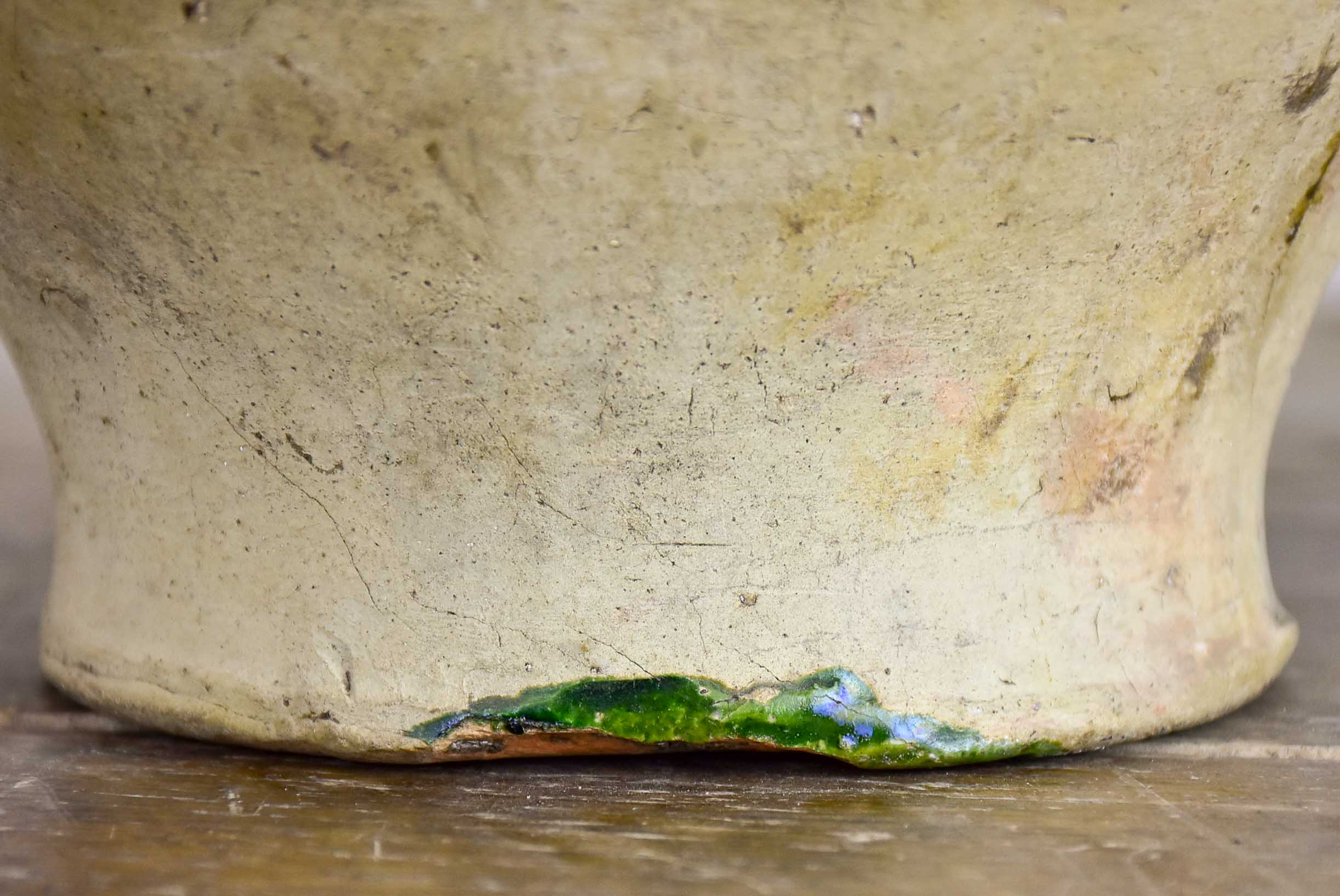 Antique French water jug with yellow and green glaze