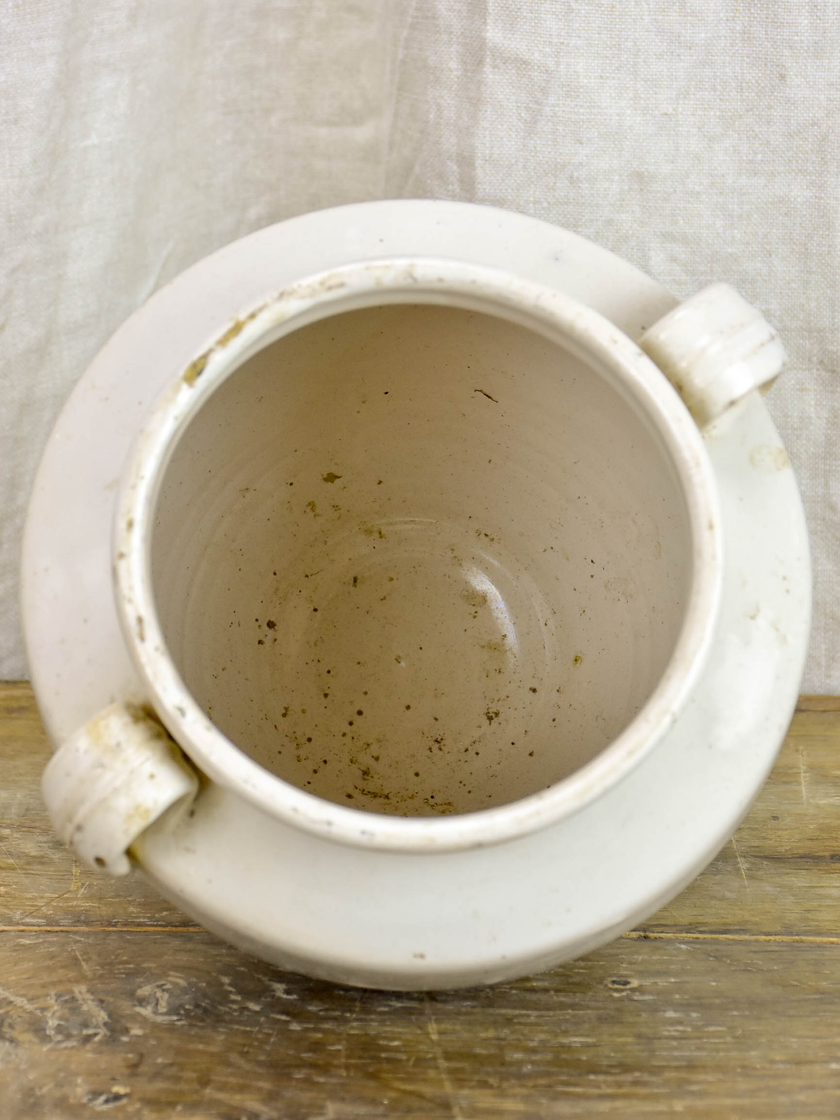 Antique earthenware preserving pot with white glaze