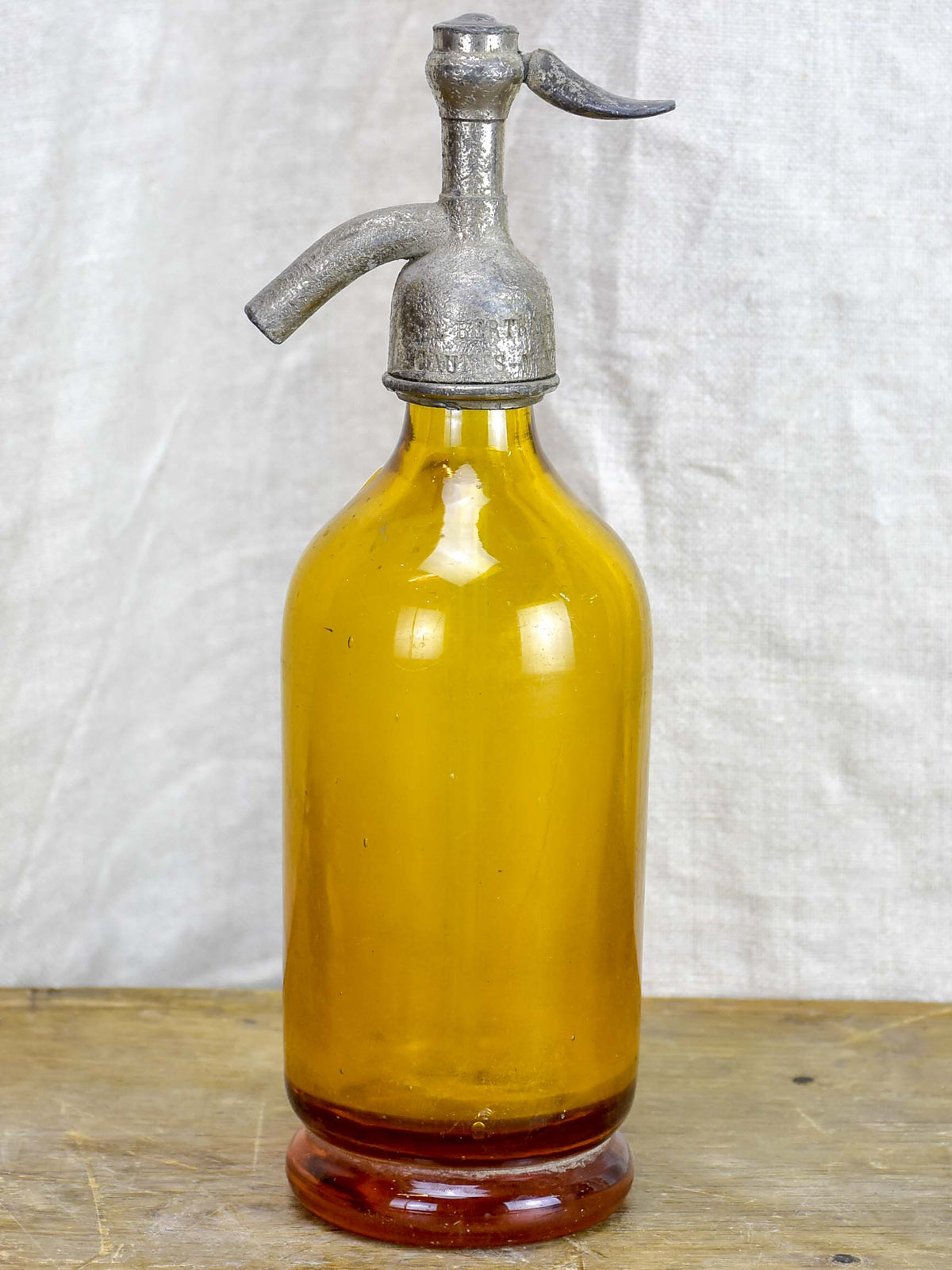 Antique French half-size Seltzer bottle - yellow / amber