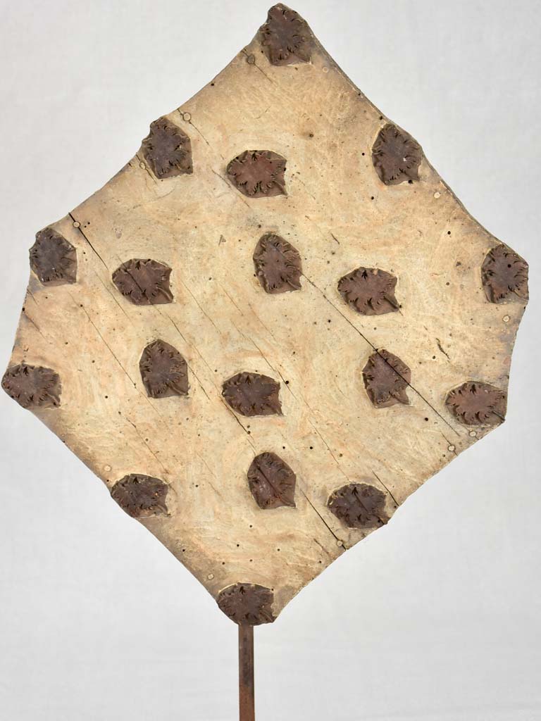 19th-century salvaged printing stamp from a silk maker in Lyon - leaves
