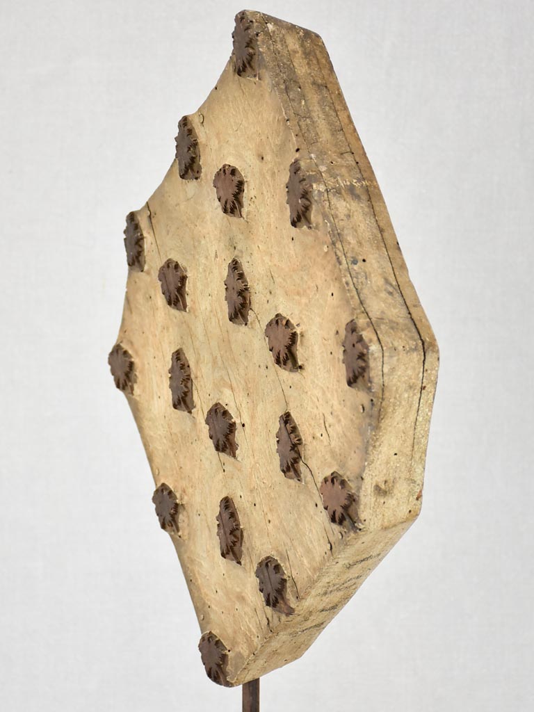 19th-century salvaged printing stamp from a silk maker in Lyon - leaves