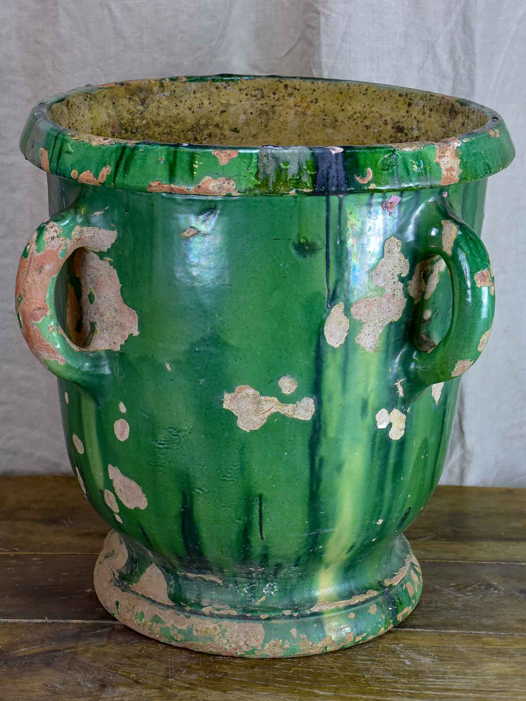 Very large antique French garden planter with green glaze and 4 handles