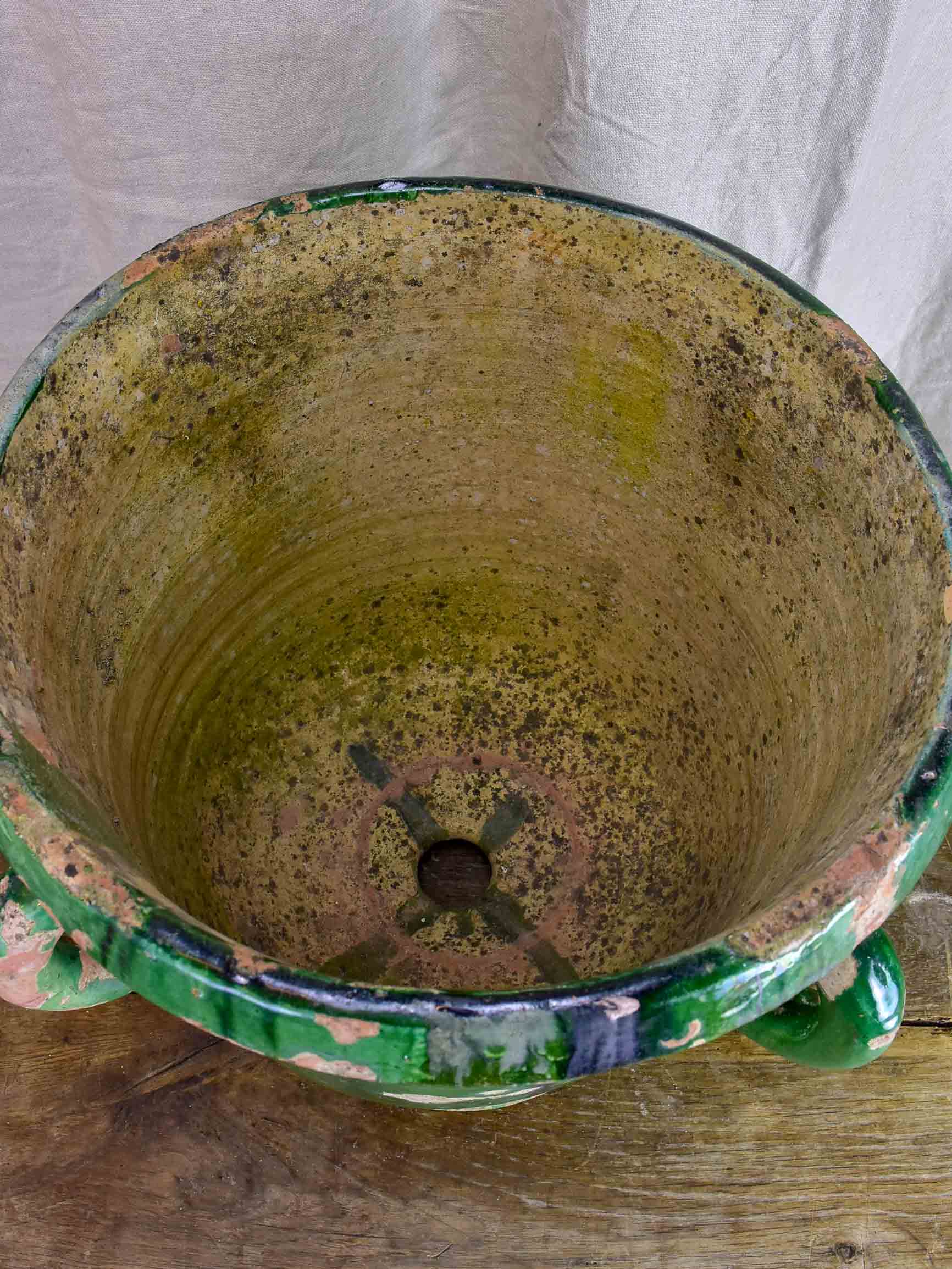 Very large antique French garden planter with green glaze and 4 handles