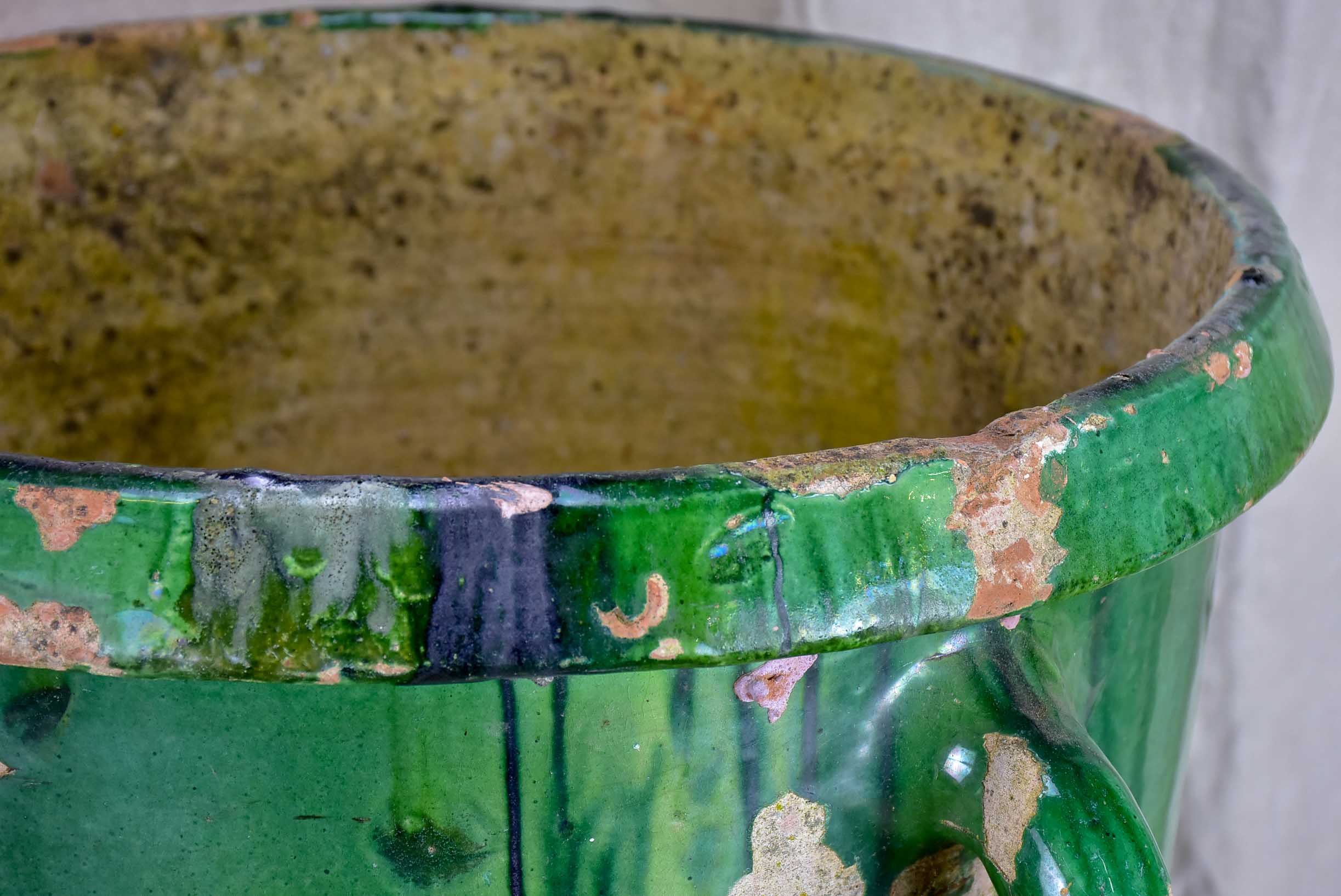 Very large antique French garden planter with green glaze and 4 handles