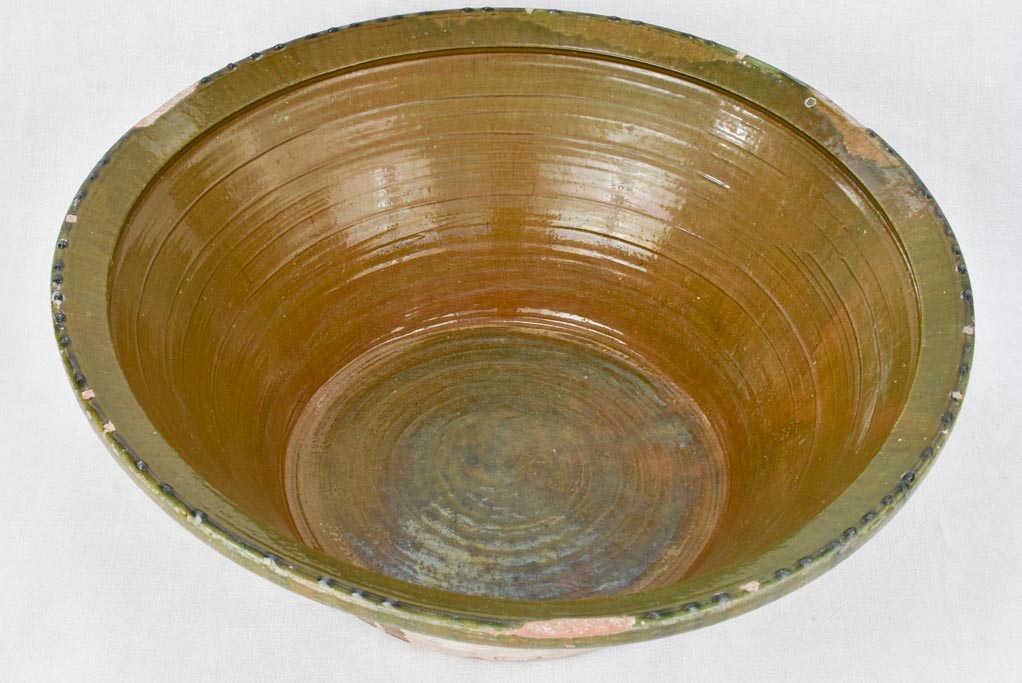 Very large tian terracotta bowl with olive green glaze 33½"