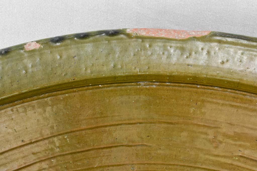Very large tian terracotta bowl with olive green glaze 33½"