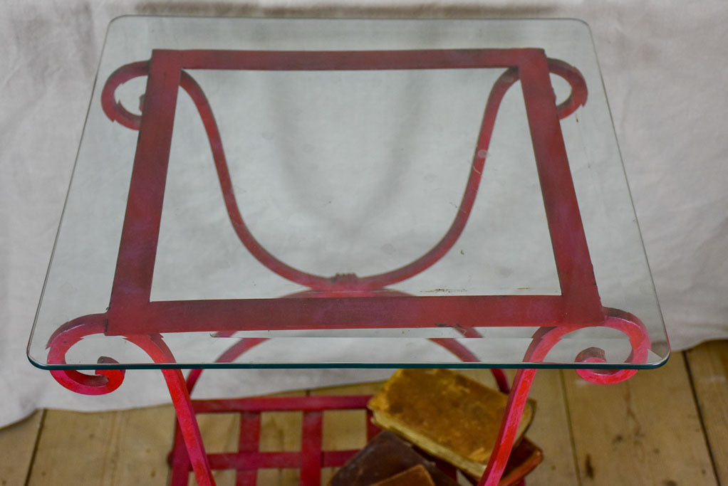 Pair of 1960's side tables - red wrought iron with glass tops 19¾" x 19¾"
