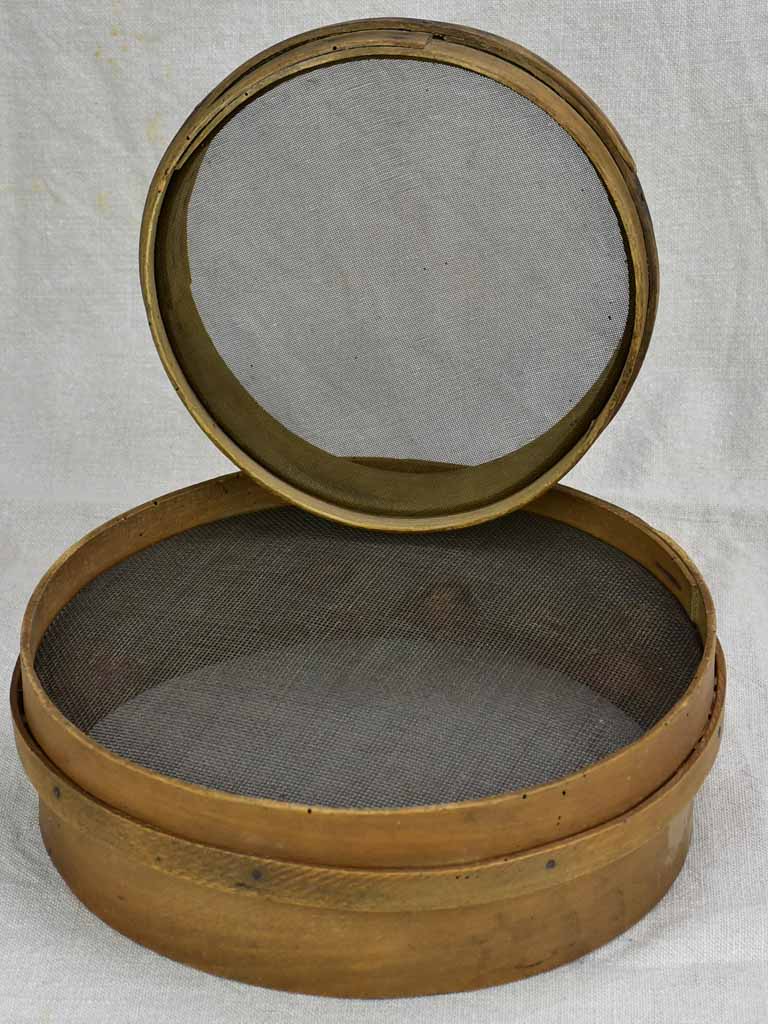 Two antique French flour sieves