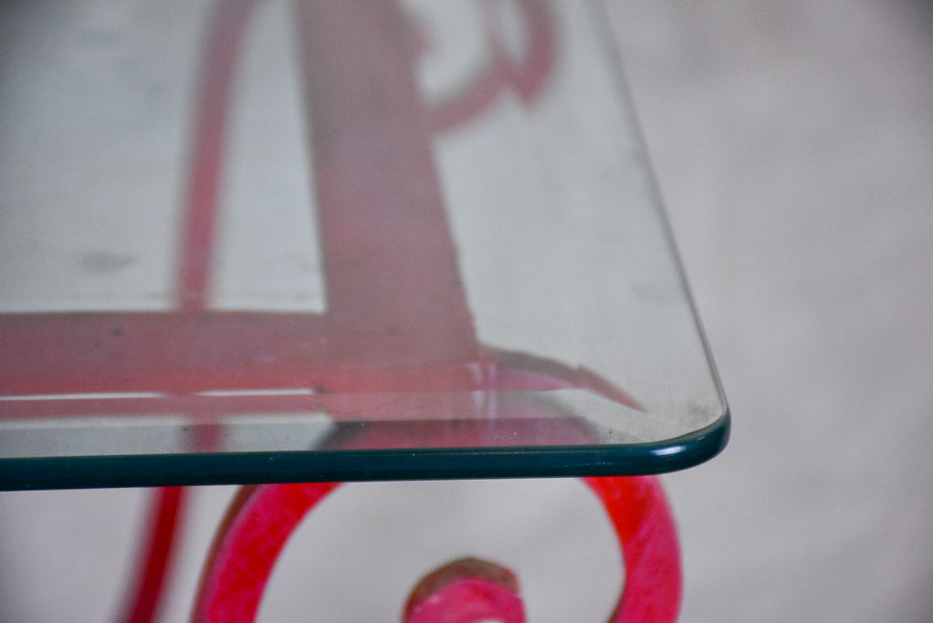Pair of 1960's side tables - red wrought iron with glass tops 19¾" x 19¾"