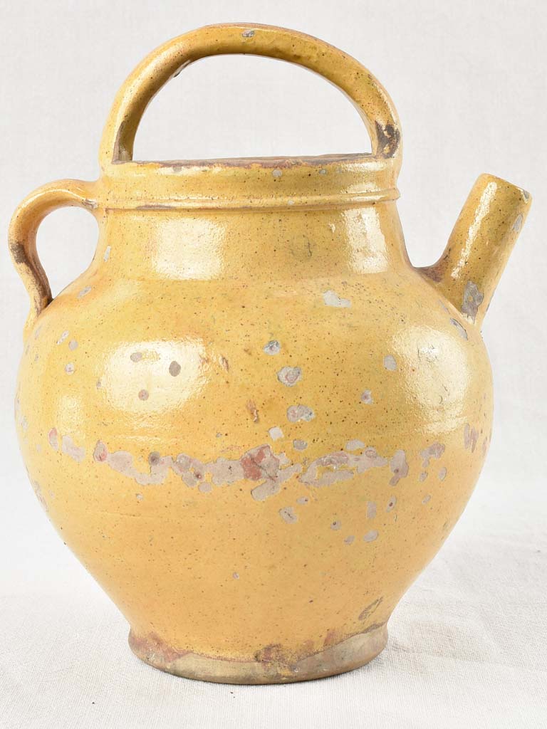 Early 20th century water pitcher with yellow glaze 12¼"