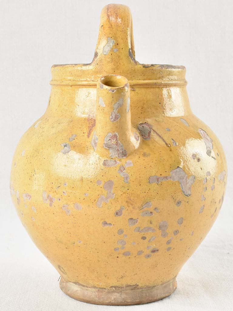 Early 20th century water pitcher with yellow glaze 12¼"