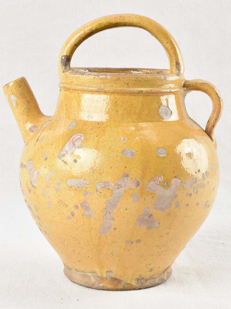 Early 20th century water pitcher with yellow glaze 12¼"
