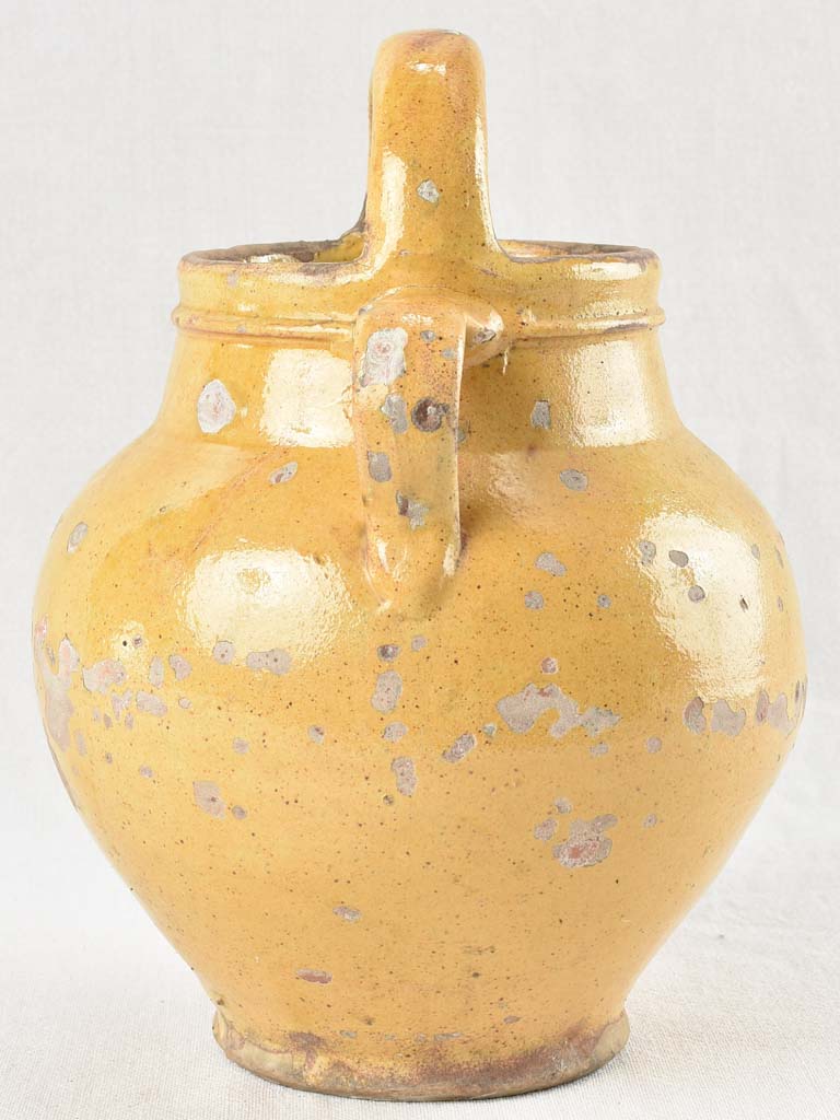 Early 20th century water pitcher with yellow glaze 12¼"
