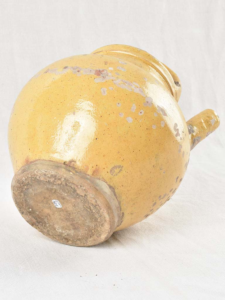 Early 20th century water pitcher with yellow glaze 12¼"
