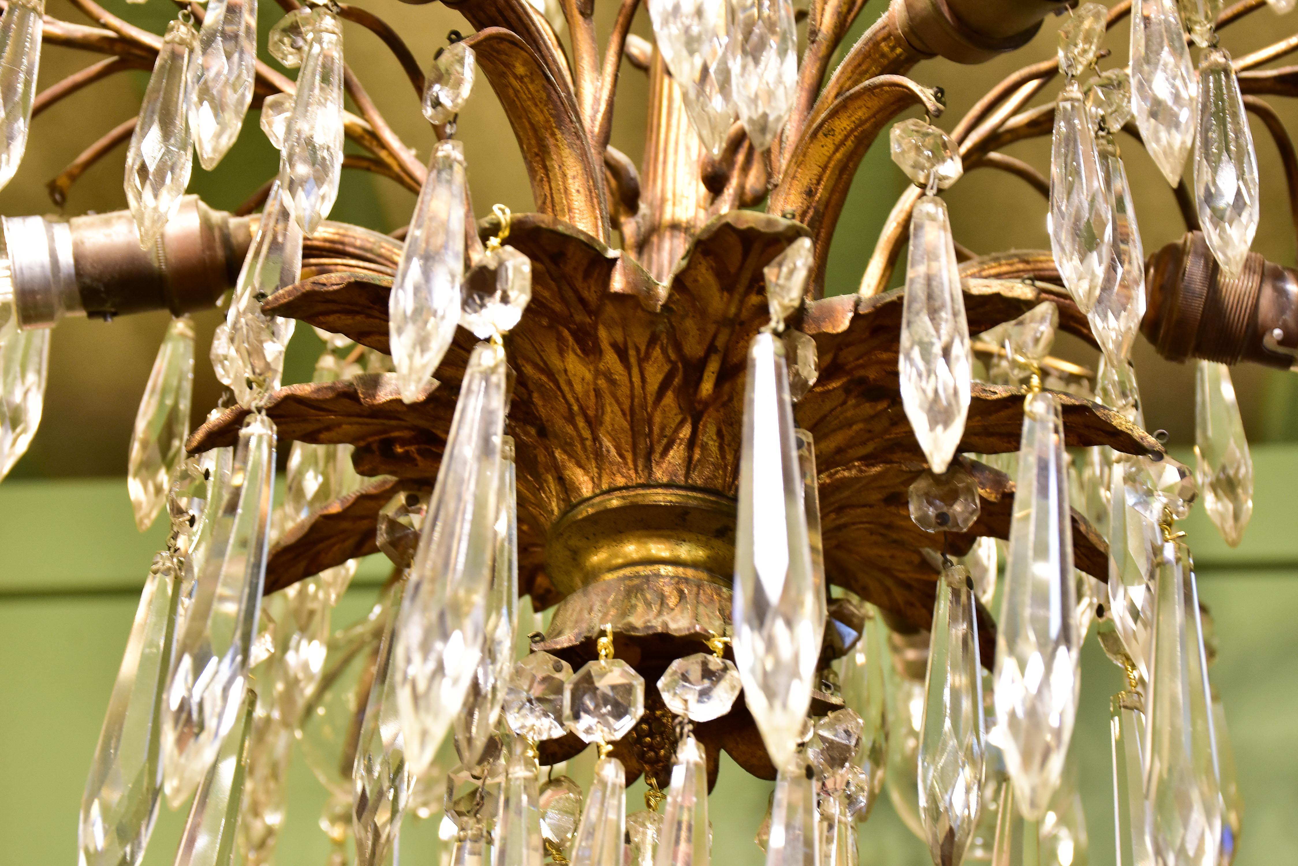 Gold palm frond chandelier with crystals