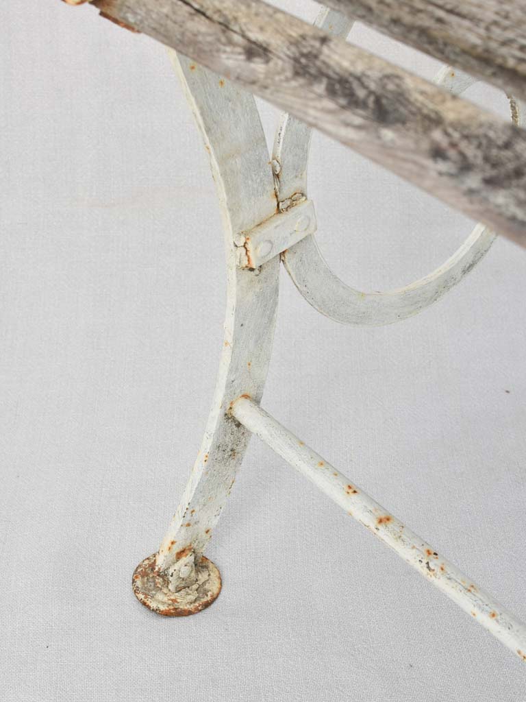 Antique outdoor bench with French elegance