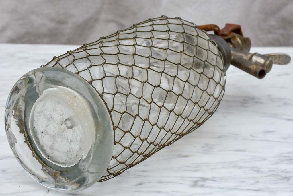 Early 20th Century French seltzer bottle with mesh