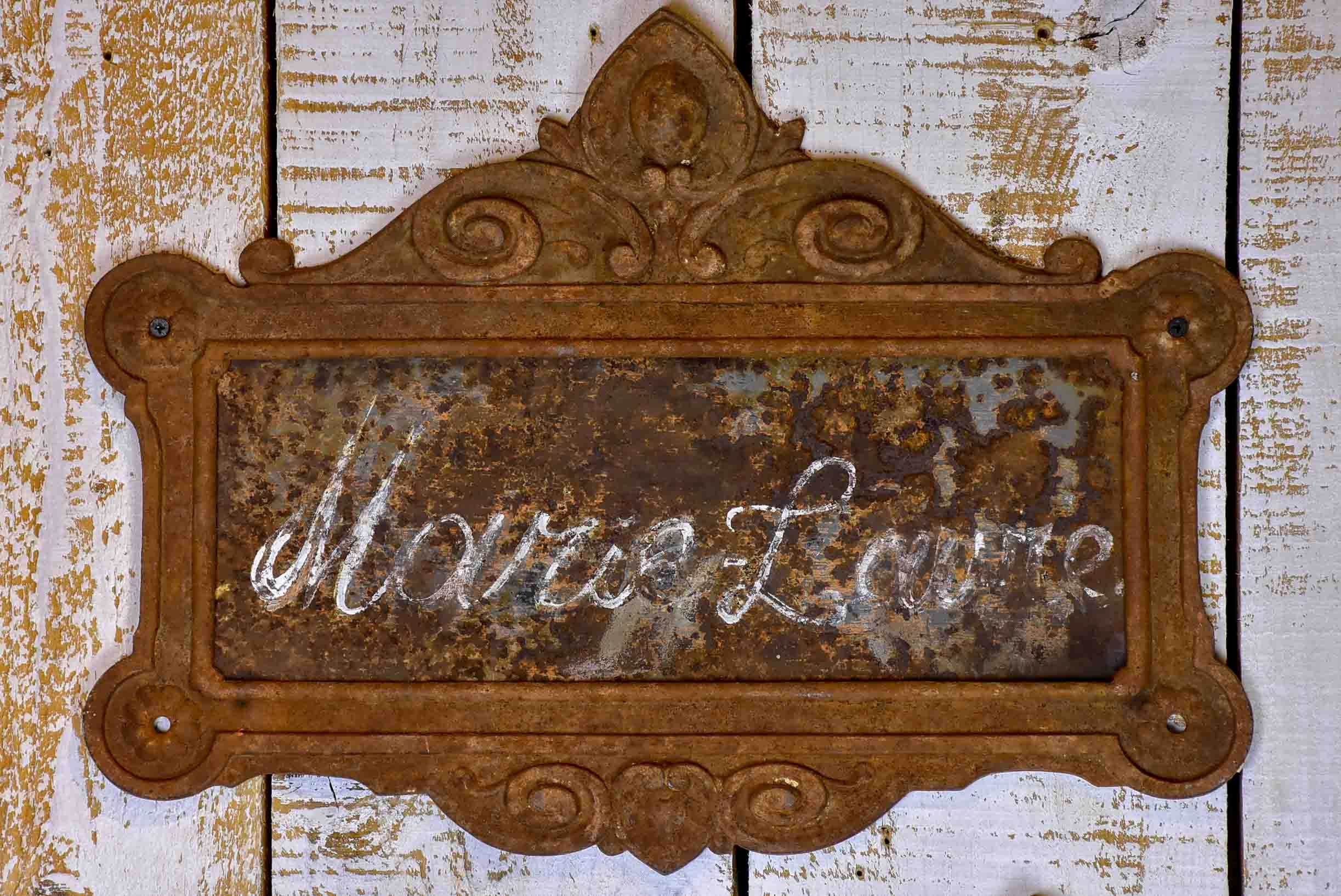 Two antique French cast iron signs from horse stables