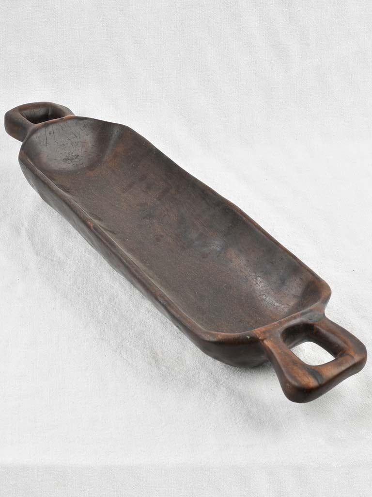 Handmade early-twentieth-century long wooden bowl