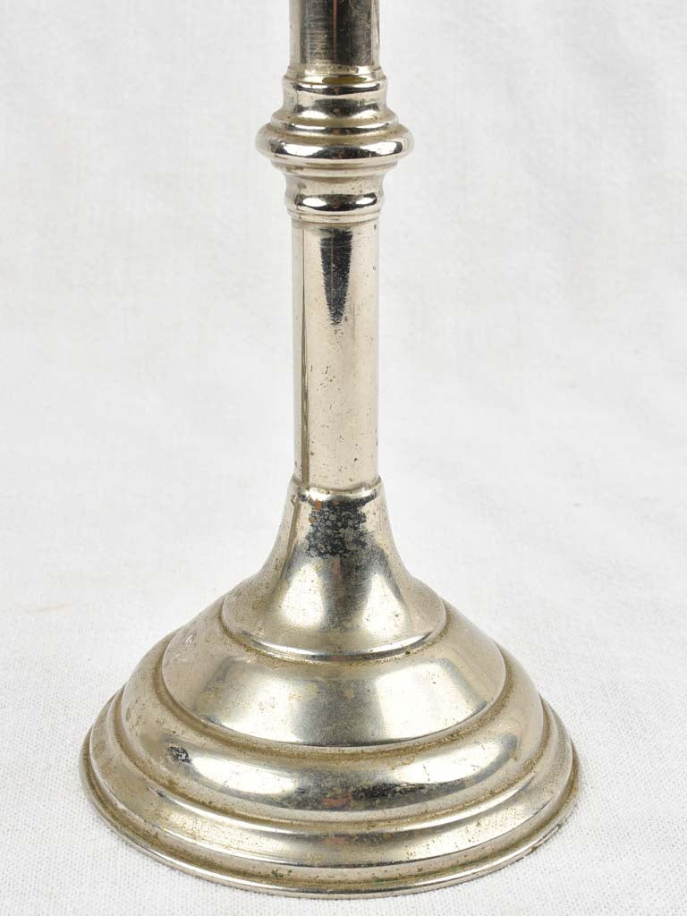 Two antique footed coin trays from a counter