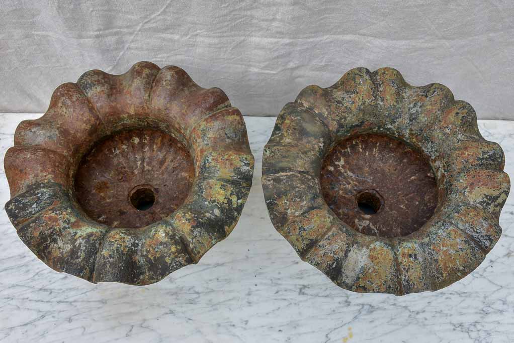 Pair of 19th Century cast iron Medici urns with lion's heads